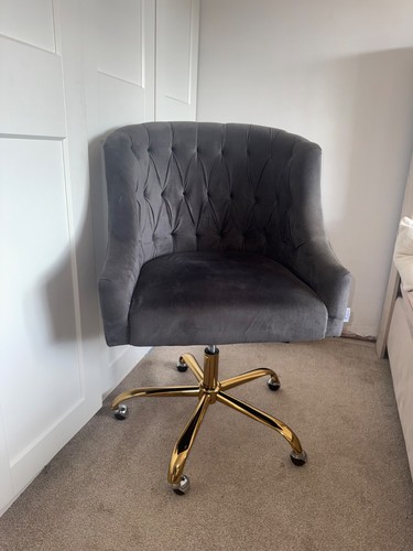 Grey velvet button tufted